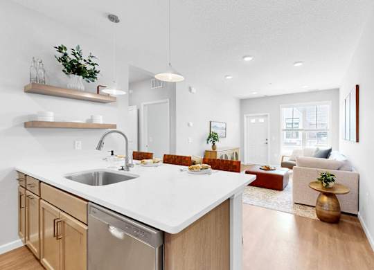 A modern kitchen with wooden cabinets and a white countertop.