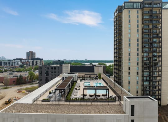 a view of the pool from the top of the building