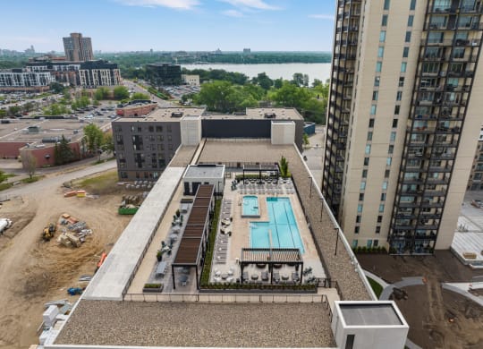 a view of the pool from the top of the building