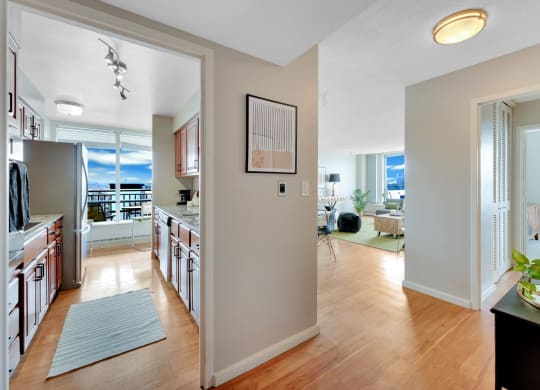 an open kitchen and living room with a view of the living room and dining room