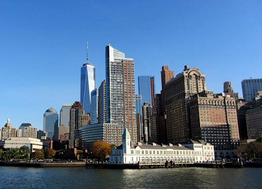 A city skyline with a large  building in the middle at Aria, New York, 10038