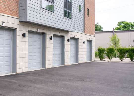 A row of garage doors are closed.