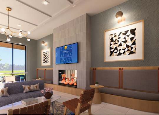 A modern living room with a grey sofa, a coffee table, a TV, and a fireplace.