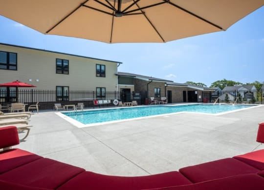 our apartments have a large pool and lounge chairs