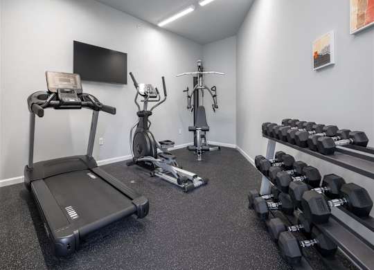 the gym at the flats at big tex apartments