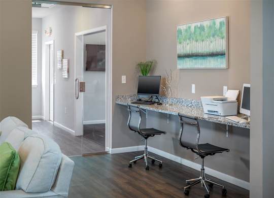a home office with a desk and a computer
