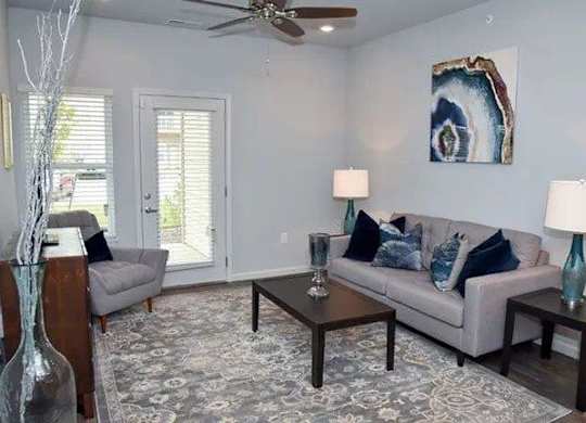 a living room with a couch and a table