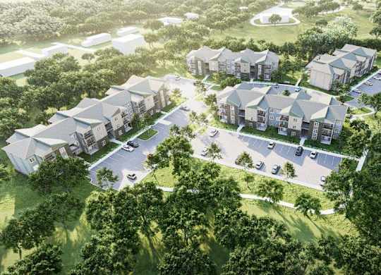 A bird's eye view of a residential area with houses and trees.