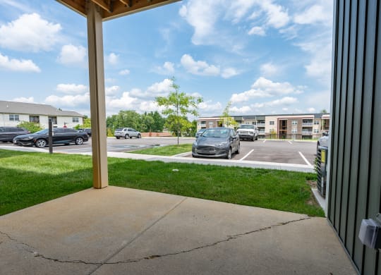 a view of a parking lot with cars parked in it