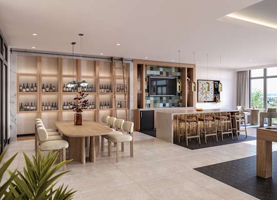 A modern living room with a pool table and a bar area.