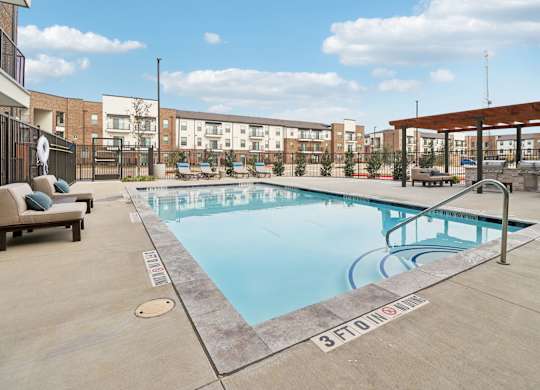 A swimming pool with the number 3 on the ground.