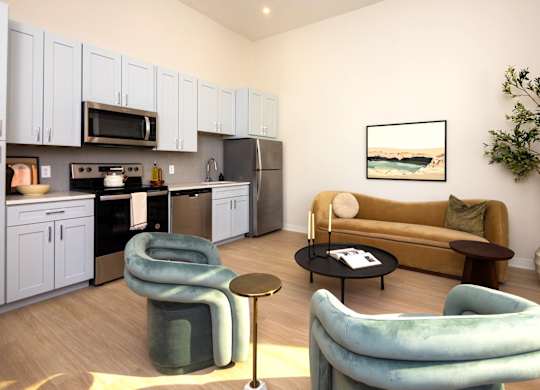 A modern living room with a couch, two chairs, and a coffee table.