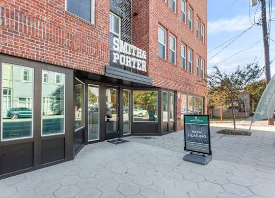 The front of a building with a sign that says