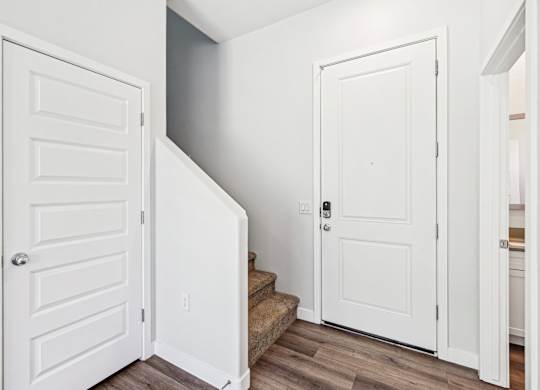 Baseline on 16th townhome stairway to the 2nd floor