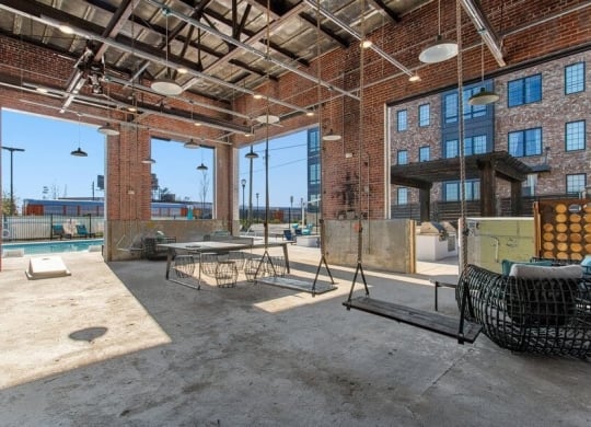 a large room with a pool and a brick building at Smith and Porter, Atlanta, GA, 30313
