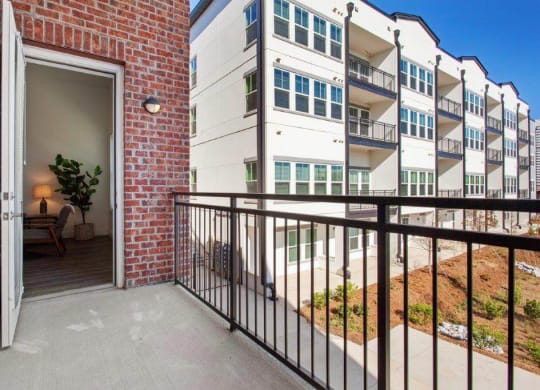 the view from the balcony of an apartment building with the door open at Smith and Porter, Atlanta, GA, 30313