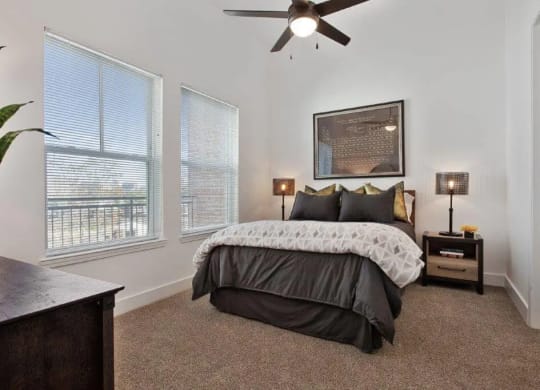 a bedroom with a bed and a ceiling fan at Smith and Porter, Atlanta, 30313