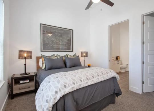 a bedroom with a bed and a ceiling fan at Smith and Porter, Atlanta, GA, 30313