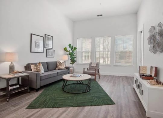 a living room with a couch and a table at Smith and Porter, Georgia, 30313