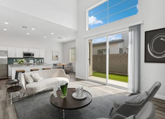 a living room with a couch and a table at Baseline on 16, Phoenix