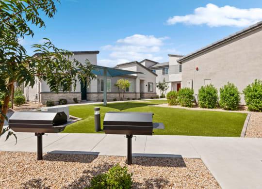 two ping pong tables in front of a houseat Baseline on 16, Phoenix