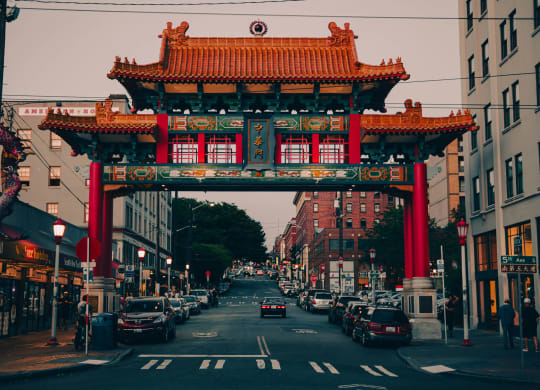a chinatown gate in the middle of a city street