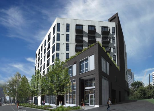 a rendering of an apartment building on a city street