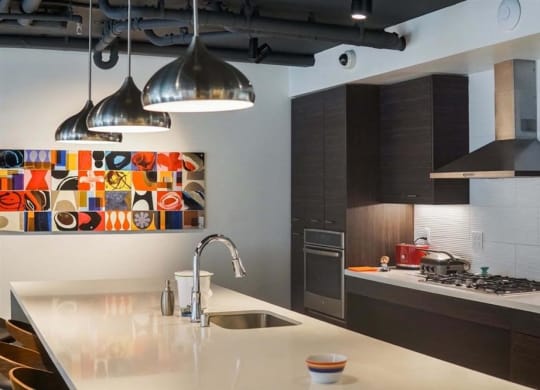 a kitchen with a counter top and a sink
