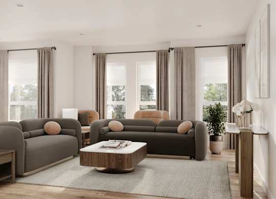 A modern living room with grey sofas and wooden coffee tables.