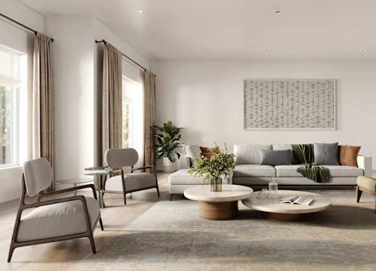 A living room with a grey sofa, a coffee table, and a large artwork on the wall.