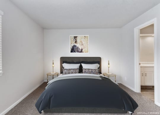 a bedroom with a bed and a window  at Eastwood Crossings, Kansas City, Missouri