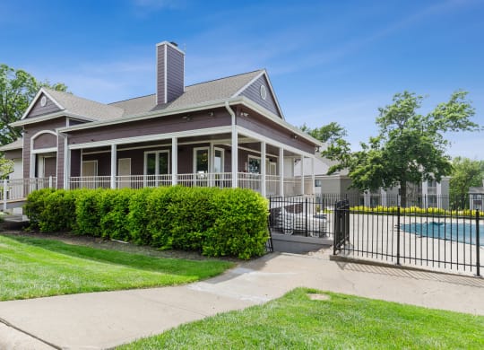 a house with a pool in front of it at Eastwood Crossings, Missouri