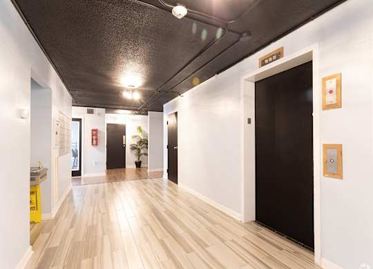 Lobby And Elevator at Capital Flats & Magnolia Square Apartments, Raleigh, NC, 27601