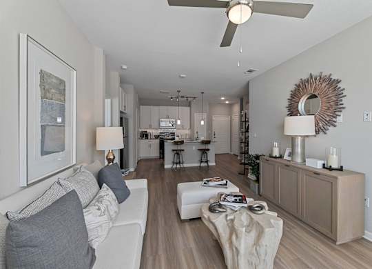 Living Room with a White Couch at Citadel at Westpointe Apartments, Texas, 78245