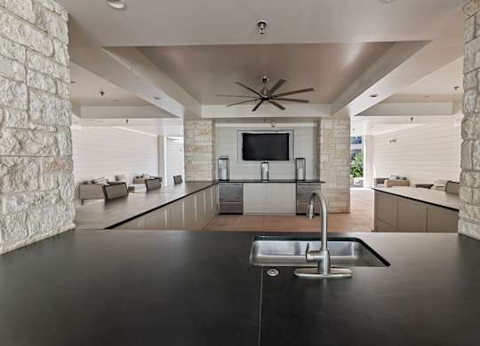 Kitchen with a Ceiling Fan at Citadel at Westpointe Apartments, San Antonio, TX, 78245