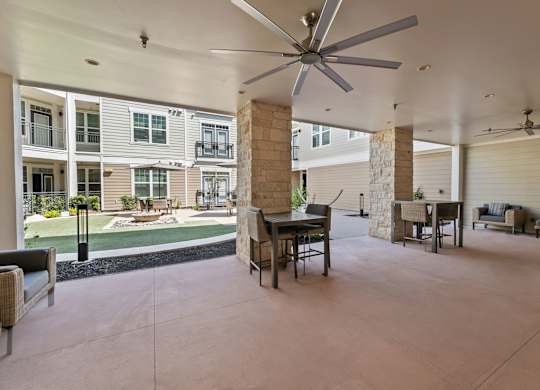 A Patio with a Ceiling Fan at Citadel at Westpointe Apartments, San Antonio, TX