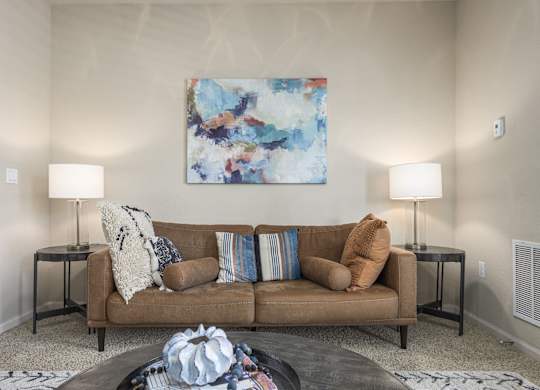 Living Room with a Brown Couch at Spring Creek Apartments, Crestview, Florida