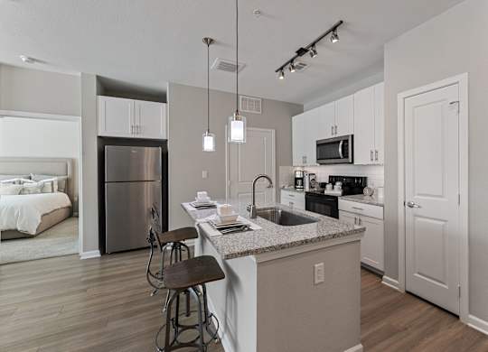 Kitchen Island With Pendent Lights at Citadel at Westpointe Apartments, San Antonio, TX, 78245