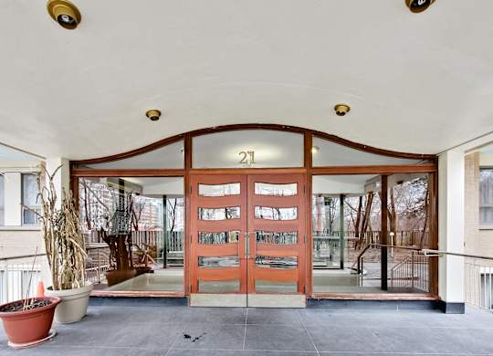 A large wooden door with the number 21 on it.