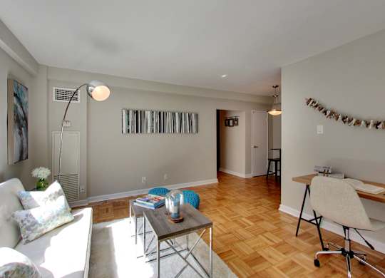 a living room with a couch and a table