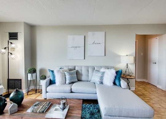 a living room with a couch and a coffee table