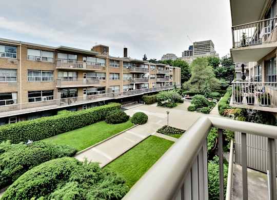 the view from the balcony of an apartment complex