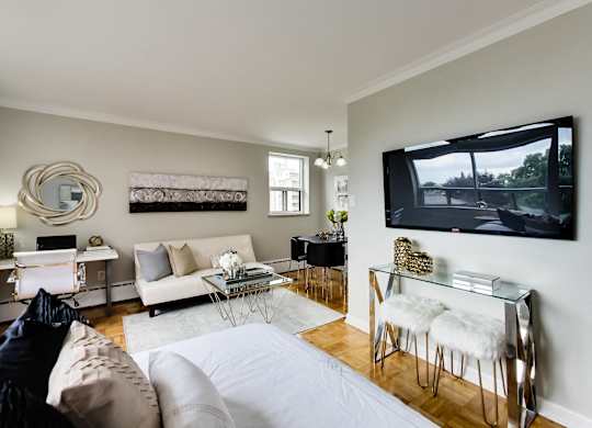 a living room with a couch and a tv