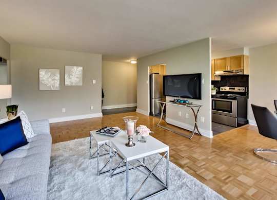 a living room with a couch and a table
