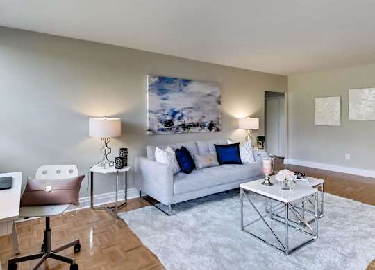 a living room with a couch and a table