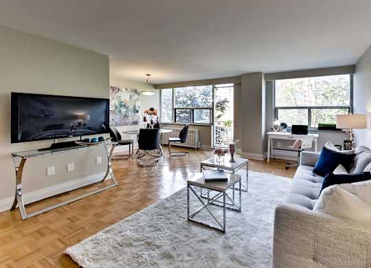 a living room with a couch and a tv