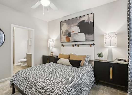a spacious bedroom with an ensuite bathroom