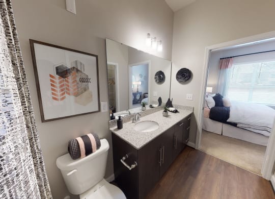 Bathroom with sink, toilet, shower and tub