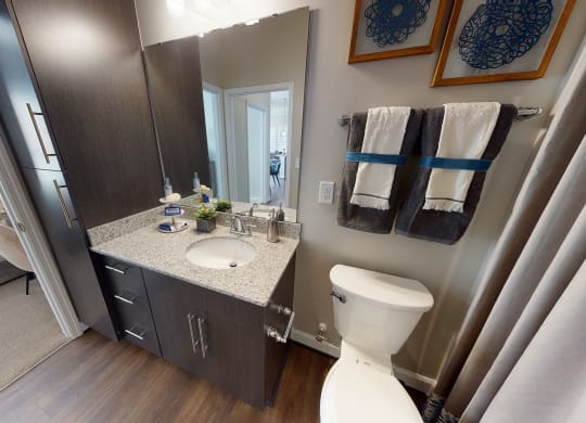 Bathroom with sink and linen closet