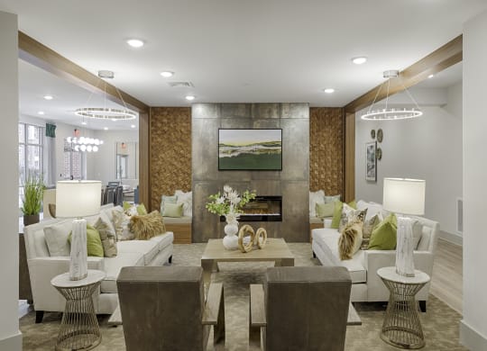 Clubhouse with seating and fireplace; flat screen TV